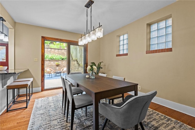 907 Greenfield Ave, Greenfield, PA 15217 - dining room featuring baseboards and light wood-type flooring