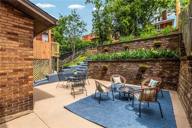 907 Greenfield Ave, Greenfield, PA 15217 - view of patio featuring an outdoor fire pit and stairway