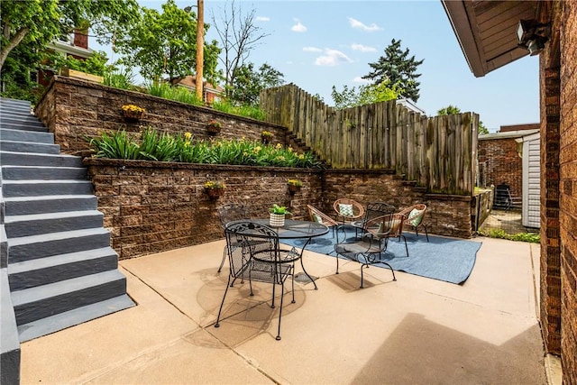 907 Greenfield Ave, Greenfield, PA 15217 - view of patio / terrace featuring stairs and outdoor dining space