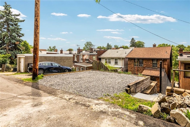 907 Greenfield Ave, Greenfield, PA 15217 - rear view of property with brick siding