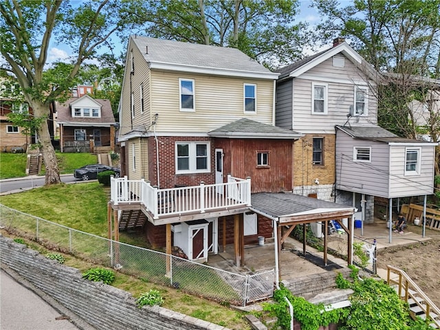 332 Reifert St, Knoxville, PA 15210 - rear view of house with a gate, a deck, stairway, brick siding, and a shingled roof