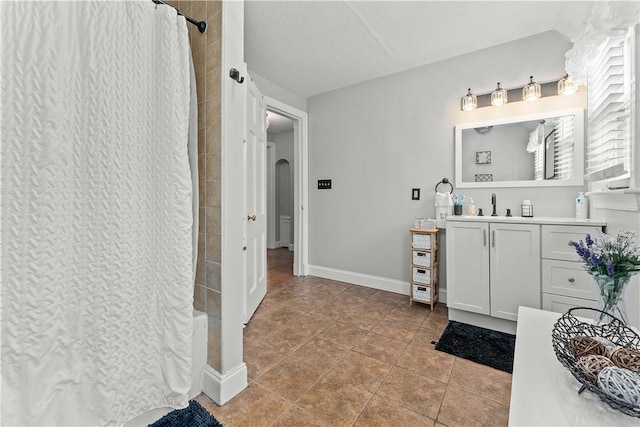 55 Evergreen Ter, Uniontown, PA 15401 - full bath featuring vanity, toilet, baseboards, tile patterned flooring, and shower / bath combination with curtain