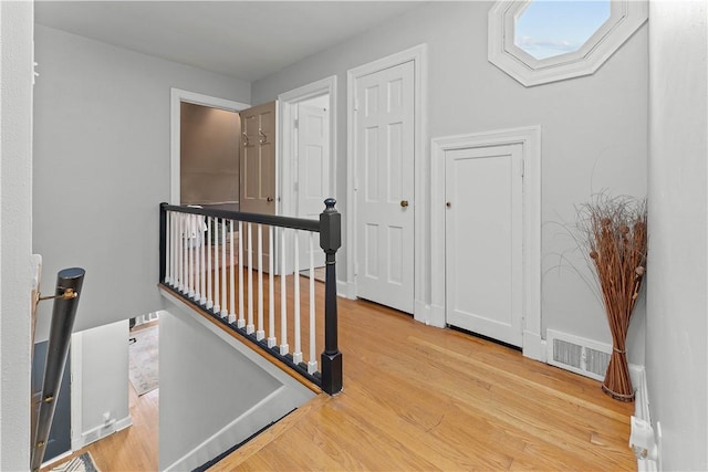 55 Evergreen Ter, Uniontown, PA 15401 - hall featuring an upstairs landing and wood finished floors