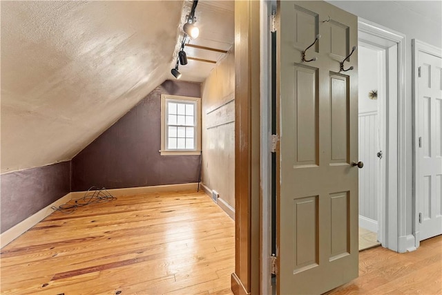 55 Evergreen Ter, Uniontown, PA 15401 - bonus room featuring light wood-style flooring, baseboards, and vaulted ceiling