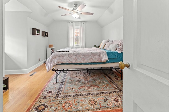 55 Evergreen Ter, Uniontown, PA 15401 - bedroom featuring lofted ceiling, light wood finished floors, baseboards, and a ceiling fan