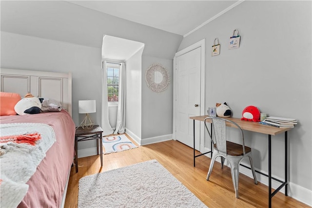 55 Evergreen Ter, Uniontown, PA 15401 - bedroom with wood finished floors, vaulted ceiling, and baseboards