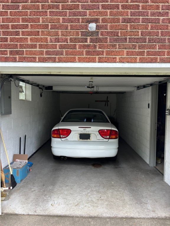 1132 Onondago St, Squirrel Hill, PA 15218 - garage with electric panel and concrete block wall