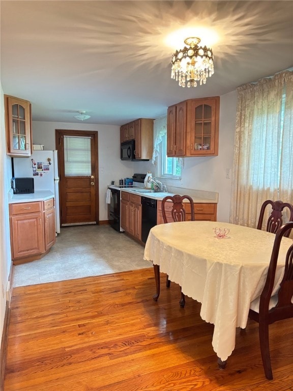 1132 Onondago St, Squirrel Hill, PA 15218 - dining space featuring a chandelier and baseboards