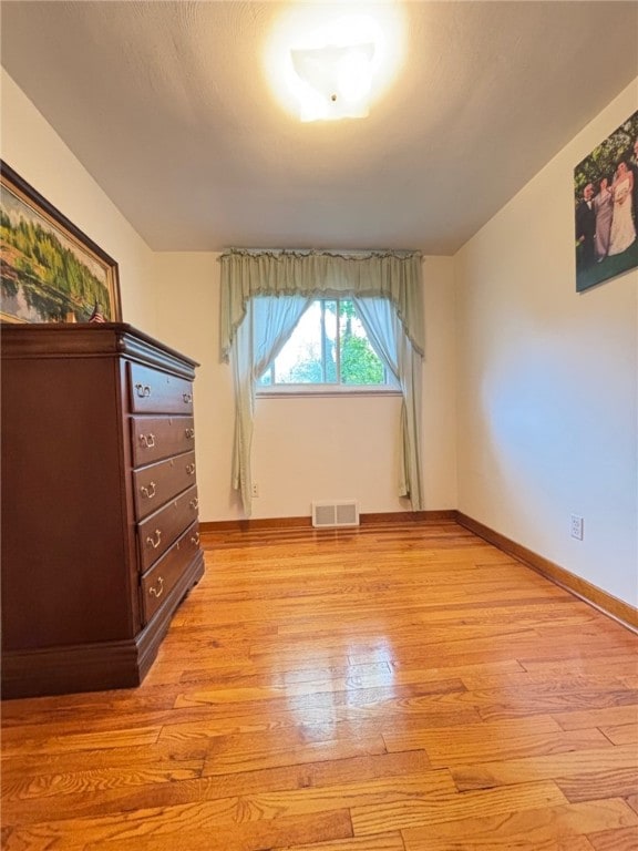 1132 Onondago St, Squirrel Hill, PA 15218 - unfurnished bedroom featuring light wood-style floors and baseboards