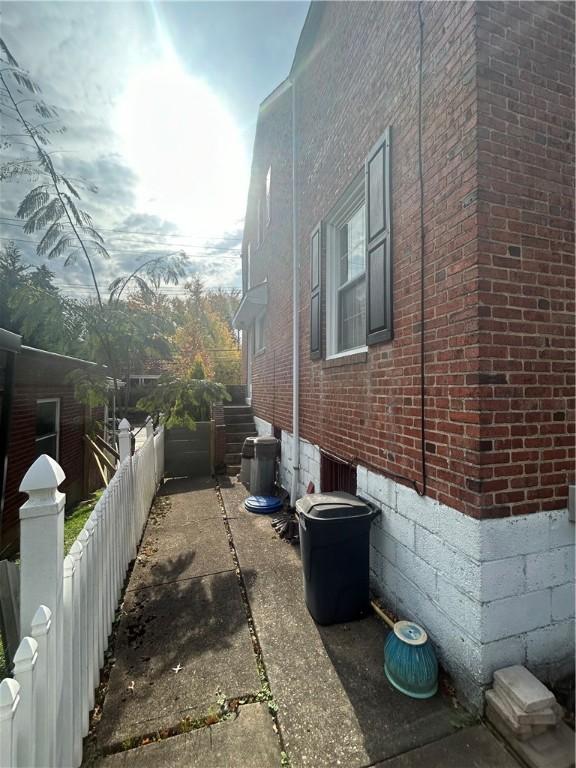 4735 Stanton Ave, Stanton Heights, PA 15201 - view of side of home with brick siding and central AC
