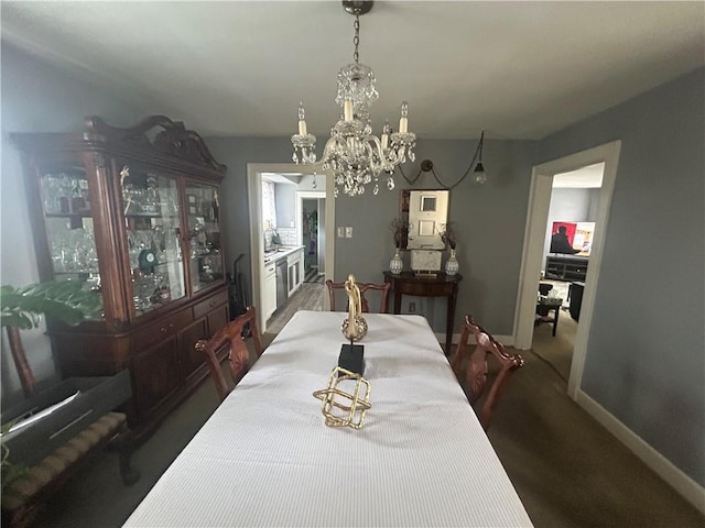 4735 Stanton Ave, Stanton Heights, PA 15201 - dining space featuring a chandelier and baseboards