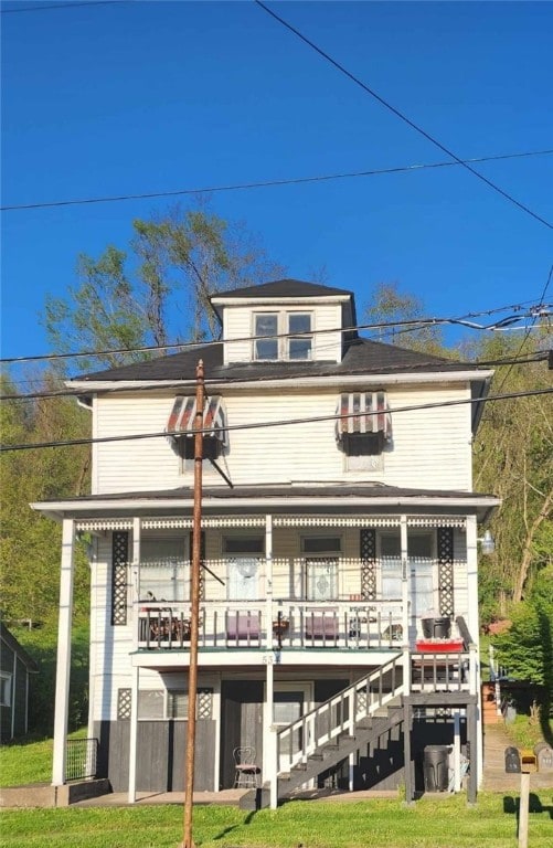 534 Broadway St, Masontown, PA 15461 - rear view of house with stairway and a lawn
