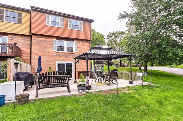 101 Canyon Ct, Unity Twp, PA 15650 - rear view of house with a gazebo, a yard, a patio area, and brick siding