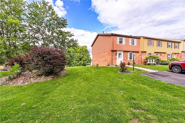101 Canyon Ct, Unity Twp, PA 15650 - view of front of home with brick siding and a front yard