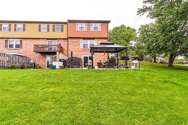 101 Canyon Ct, Unity Twp, PA 15650 - back of property with a gazebo, a yard, and brick siding