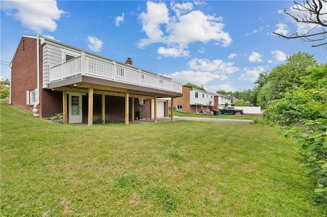 34 Eichelberger Dr, Robinson Twp Nwa, PA 15108 - back of property featuring concrete driveway, an attached garage, a deck, and a lawn