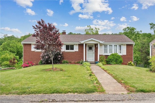 34 Eichelberger Dr, Robinson Twp Nwa, PA 15108 - view of front of home featuring brick siding, a front yard, and a chimney