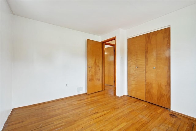 34 Eichelberger Dr, Robinson Twp Nwa, PA 15108 - unfurnished bedroom featuring light wood finished floors and a closet