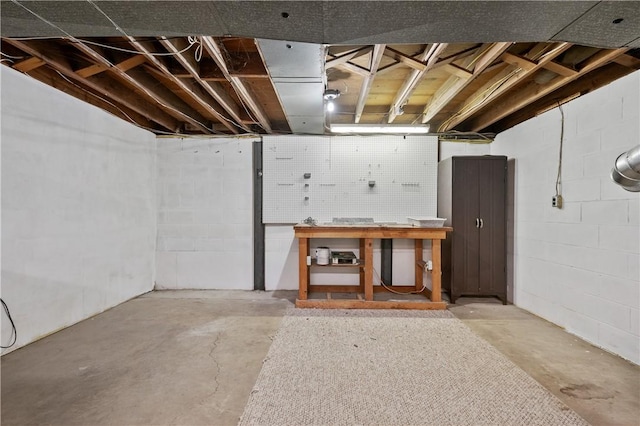 34 Eichelberger Dr, Robinson Twp Nwa, PA 15108 - unfinished basement featuring a workshop area and concrete block wall