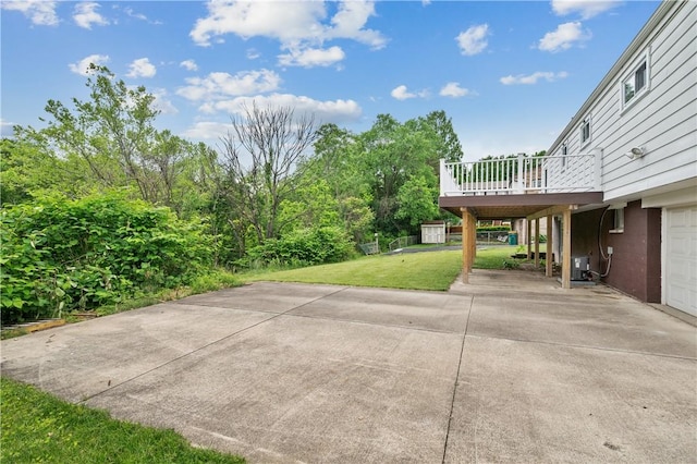34 Eichelberger Dr, Robinson Twp Nwa, PA 15108 - view of patio / terrace with a deck, central air condition unit, and a garage