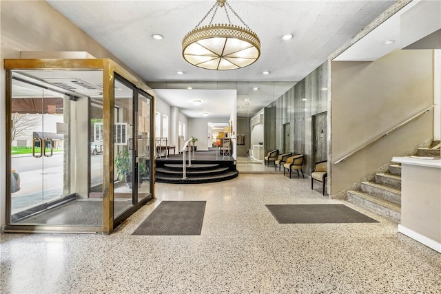 144 N Dithridge St Unit 703, Oakland, PA 15213 - welcome area with stairs, french doors, and recessed lighting