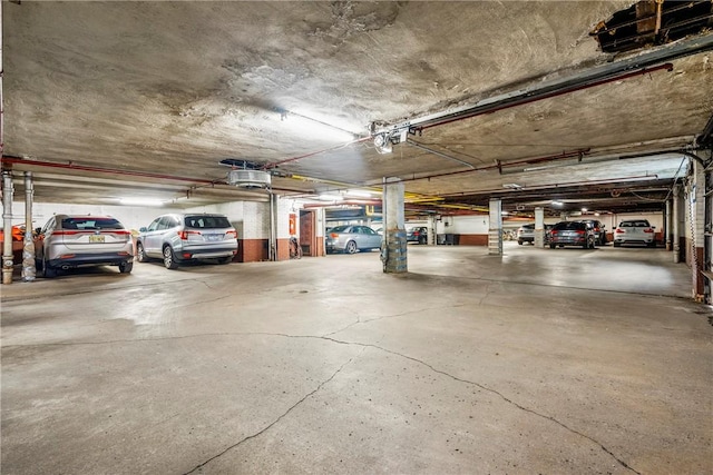 144 N Dithridge St Unit 703, Oakland, PA 15213 - parking garage featuring a garage door opener