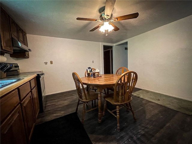 141 Minich Rd, Center Twp But, PA 16001 - dining space featuring ceiling fan, dark wood-type flooring, and baseboards