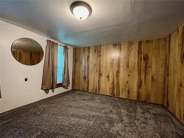 141 Minich Rd, Center Twp But, PA 16001 - carpeted empty room with wooden walls