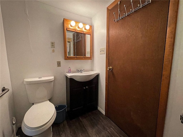 141 Minich Rd, Center Twp But, PA 16001 - bathroom featuring wood finished floors, vanity, and toilet