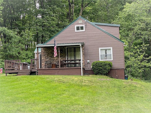 141 Minich Rd, Center Twp But, PA 16001 - rear view of property with a lawn and a forest view