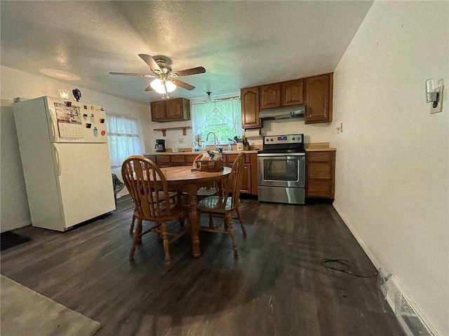 141 Minich Rd, Center Twp But, PA 16001 - kitchen featuring stainless steel electric range oven, freestanding refrigerator, under cabinet range hood, and dark wood-type flooring
