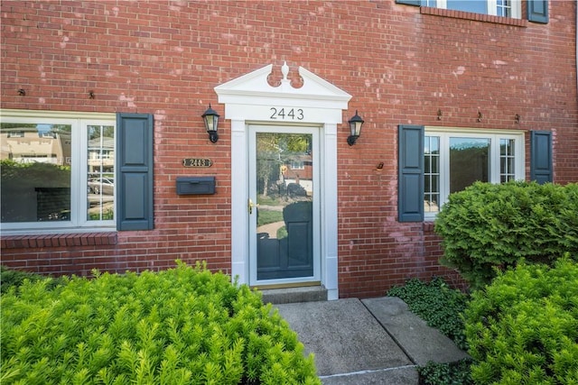 2443 Rose Garden Rd, Banksville/Westwood, PA 15220 - doorway to property featuring brick siding