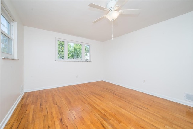2443 Rose Garden Rd, Banksville/Westwood, PA 15220 - empty room with light wood-style floors, plenty of natural light, baseboards, and a ceiling fan