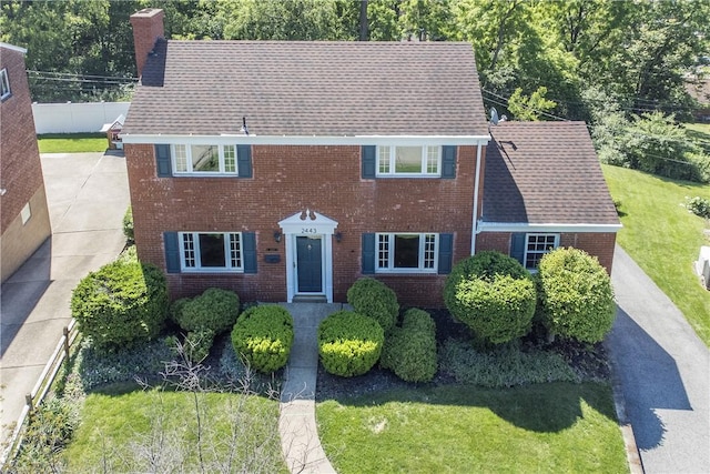 2443 Rose Garden Rd, Banksville/Westwood, PA 15220 - colonial house featuring a chimney and brick siding