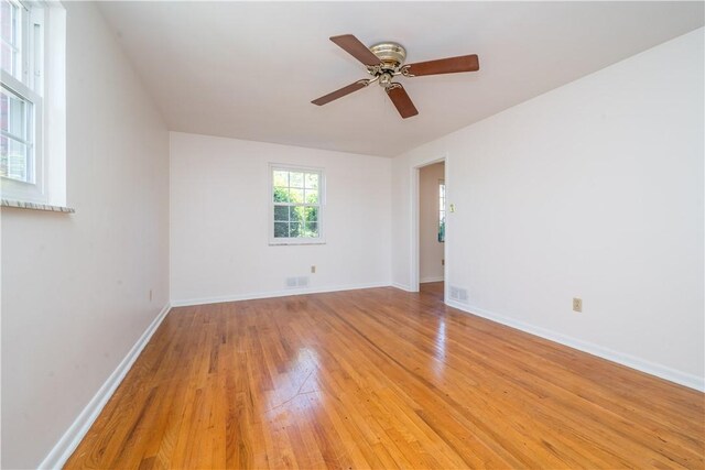 2443 Rose Garden Rd, Banksville/Westwood, PA 15220 - spare room with light wood finished floors, a ceiling fan, and baseboards
