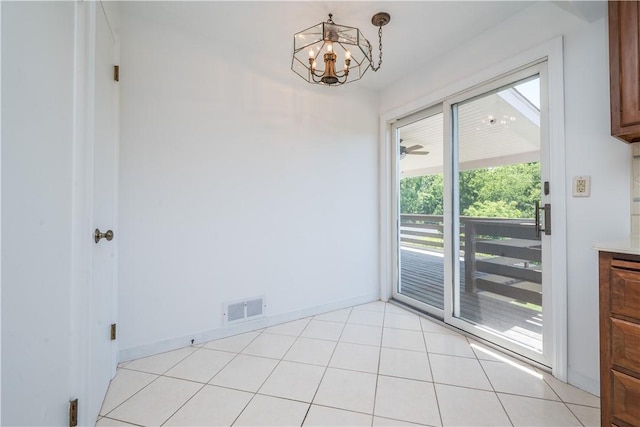 2443 Rose Garden Rd, Banksville/Westwood, PA 15220 - unfurnished dining area featuring plenty of natural light, a chandelier, and baseboards