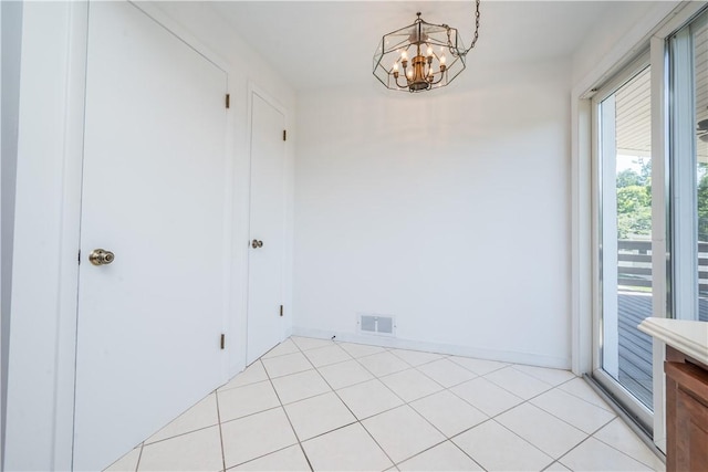 2443 Rose Garden Rd, Banksville/Westwood, PA 15220 - unfurnished room featuring a chandelier, baseboards, and light tile patterned flooring
