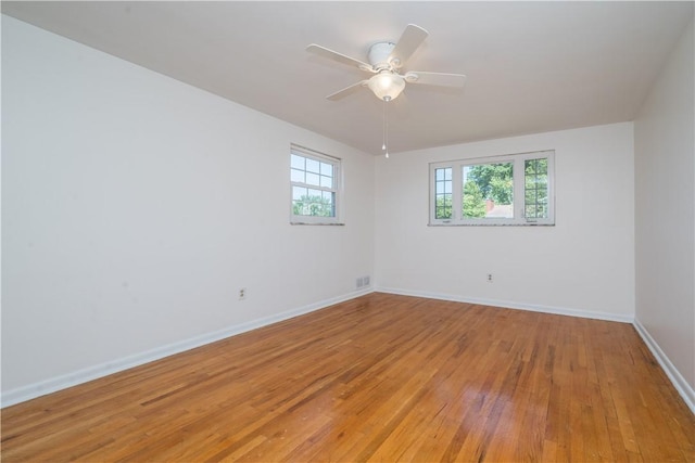 2443 Rose Garden Rd, Banksville/Westwood, PA 15220 - unfurnished room with light wood-style floors, baseboards, and ceiling fan