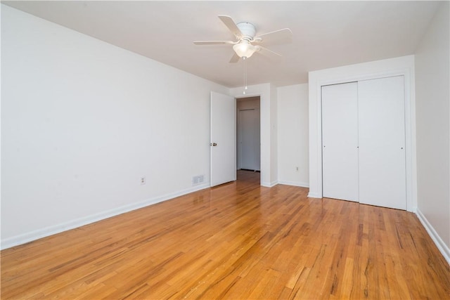 2443 Rose Garden Rd, Banksville/Westwood, PA 15220 - unfurnished bedroom with light wood finished floors, baseboards, a closet, and ceiling fan
