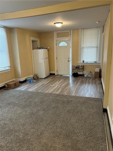 1015 Gerritt St, Homewood-Brushton, PA 15208 - foyer with wood finished floors and baseboards