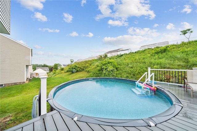 11572 Salerno Dr, North Huntingdon, PA 15642 - view of pool featuring a wooden deck and a lawn