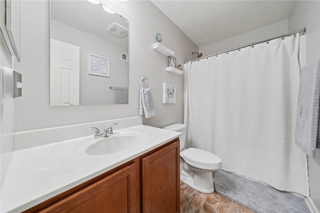 11572 Salerno Dr, North Huntingdon, PA 15642 - full bathroom featuring toilet, vanity, a shower with curtain, and stone finish floors