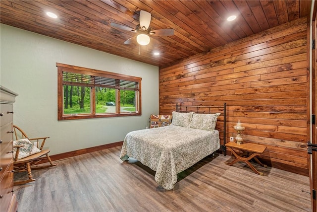 266 Deer Fern Dr, Donegal Wml, PA 15501 - bedroom with baseboards, wood finished floors, recessed lighting, wooden ceiling, and wooden walls