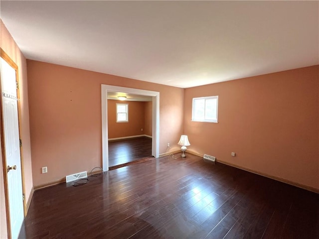122 E Elizabeth St, New Castle/2Nd, PA 16105 - spare room with healthy amount of natural light, wood finished floors, and baseboards