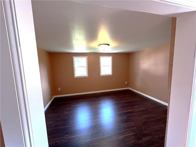 122 E Elizabeth St, New Castle/2Nd, PA 16105 - unfurnished room with baseboards and dark wood-style floors