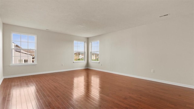 5 Heather Ct, Plum Boro, PA 15239 - empty room with dark wood-type flooring and baseboards
