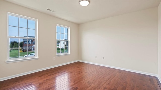 5 Heather Ct, Plum Boro, PA 15239 - empty room featuring dark wood-style flooring and baseboards