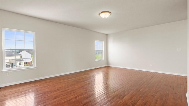 5 Heather Ct, Plum Boro, PA 15239 - empty room with hardwood / wood-style floors and baseboards