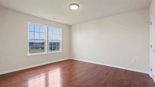 5 Heather Ct, Plum Boro, PA 15239 - spare room featuring dark wood-type flooring and baseboards