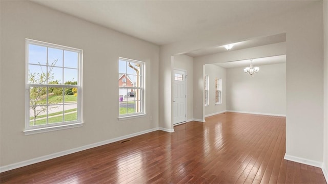 5 Heather Ct, Plum Boro, PA 15239 - unfurnished room featuring a chandelier, hardwood / wood-style flooring, and baseboards